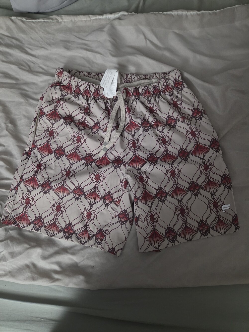 Fabletics Men's Swim Trunks in Beige and Maroon Geometric Print